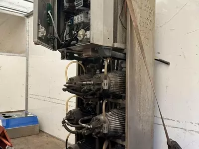 Delta booster pressure washer in worn condition before being fully reconditioned for installation at a factory in Measham.